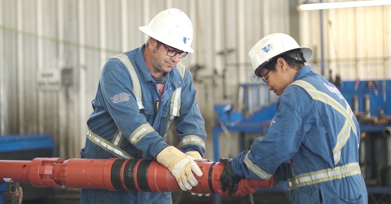 men working on pipe